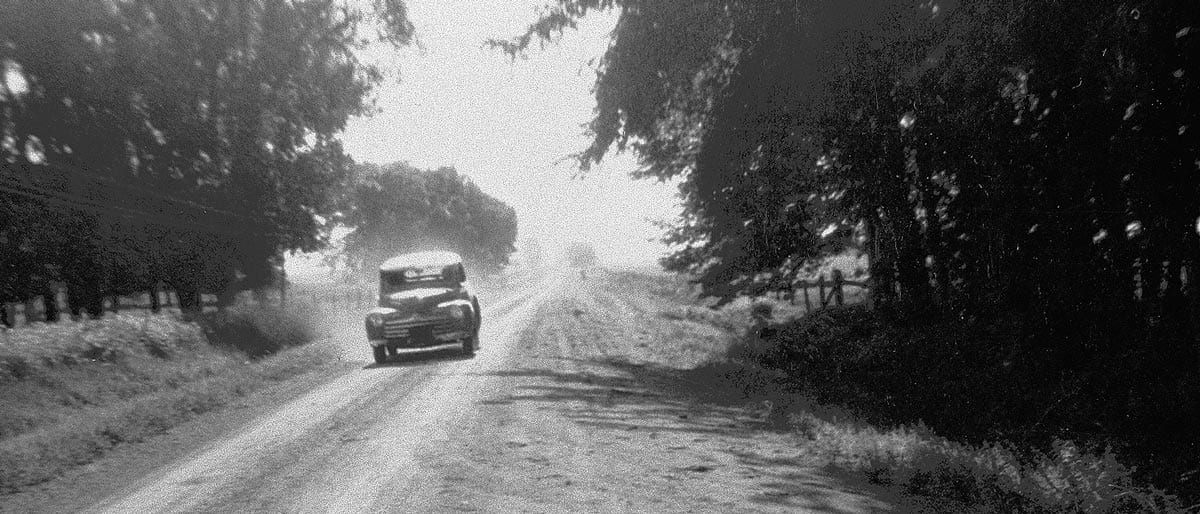 Car on road in the 1940s